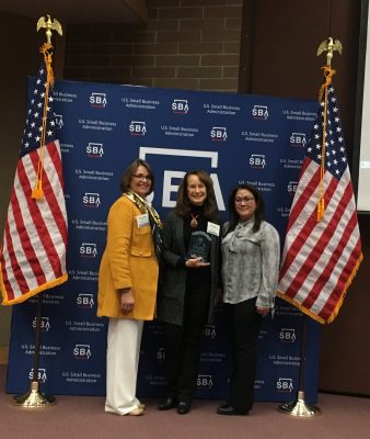 Becky Beck accepts the Small Business Advocate of the Year for Southcentral Alaska award from the U.S. Small Business Administration.