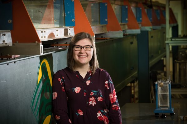 Civil engineering student Christina Young (née Hoy), president of the UAA student chapter of the Society of Women Engineers, photographed in the Fluid Mechanics Lab in UAA's Engineering and Industry Building. She is finalizing preparations to become a water/wastewater engineer. (Photo by James Evans / University of Alaska Anchorage)