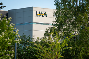 UAA Engineering & Industry Building viewed through the trees (Photo by James Evans / UAA)