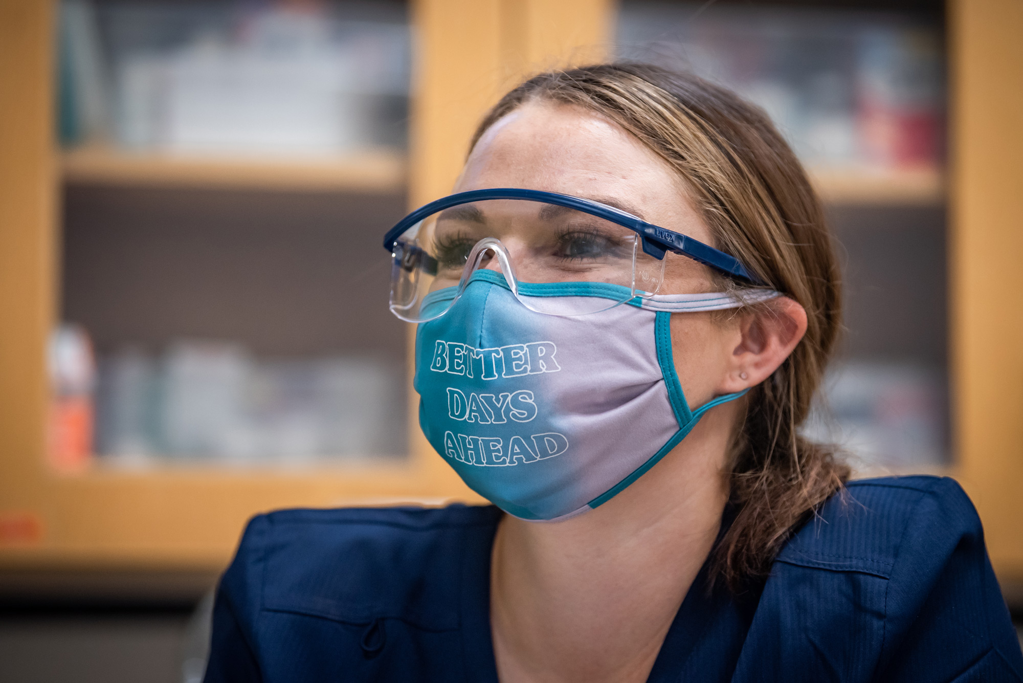 Brittney Horn reads off instructions to her lab partner as UAA Medical Assisting Program students learn to sterilize medical instruments during their first in-person lab of the Fall 2020 semester. (Photo by James Evans / UAA)