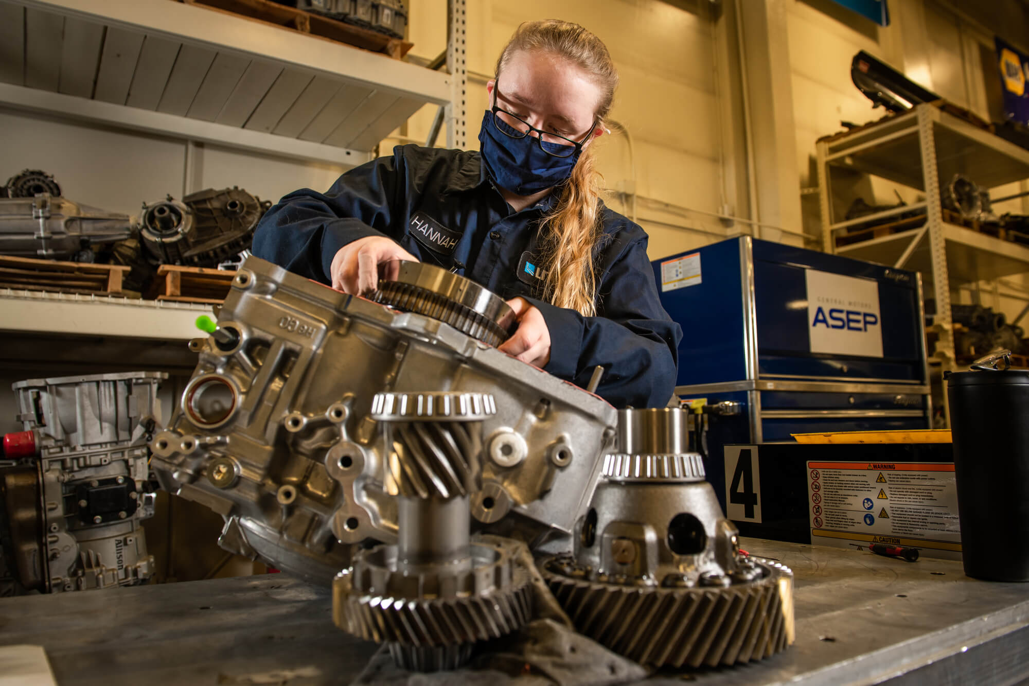 Hannah Thayer learns to reassemble an automatic transmission that was recently donated to UAA’s Automotive and Diesel Technology (ADT) Department by the General Motors (GM) Automotive Service Education Program (ASEP). (Photo by James Evans, University of Alaska Anchorage)