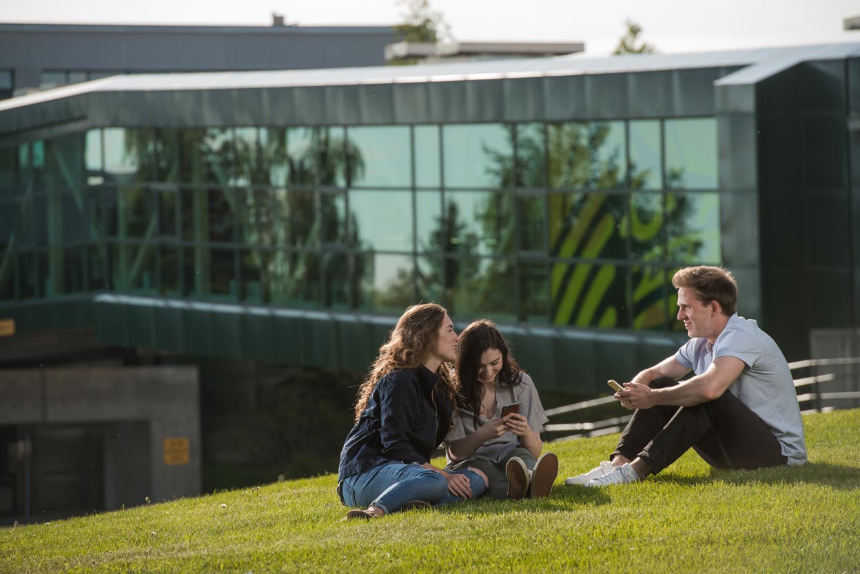 UAA students Abbie Lampman, Maile Johnston and Daniel Ogden photographed on the Anchorage campus. 