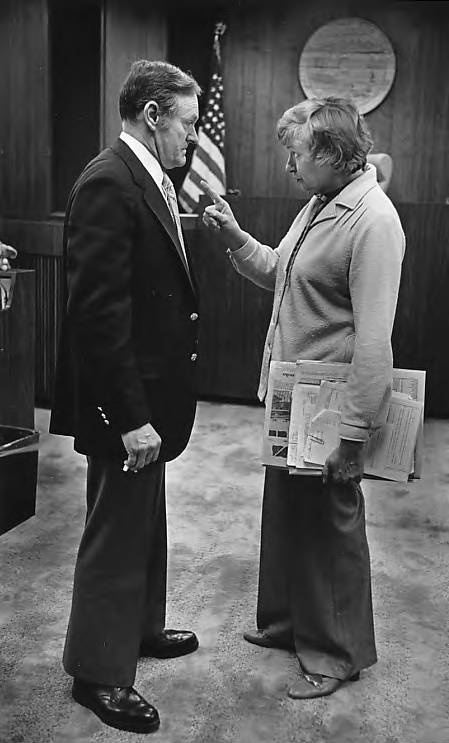 Arliss Sturgulewski and Glenn Hackney have a discussion in the Alaska Senate chambers, date unknown.