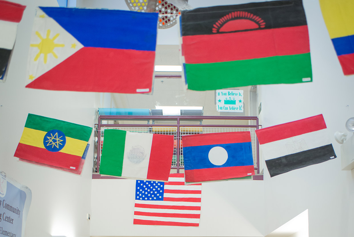 Flags from around the world hang in the hallway at Fairview Elementary School.