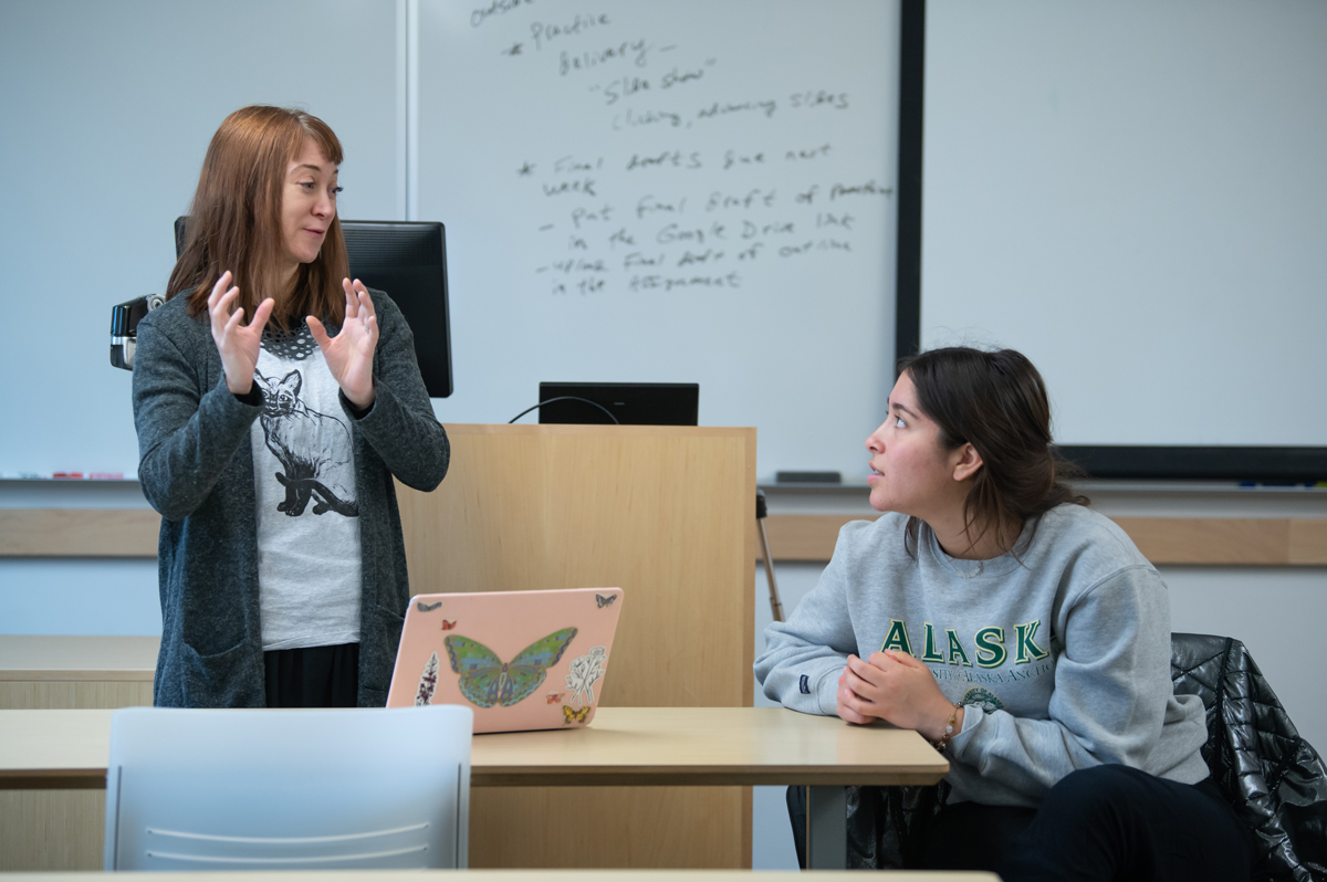 UAA instructor Michelle Scaman talks with student Selma Casagranda.