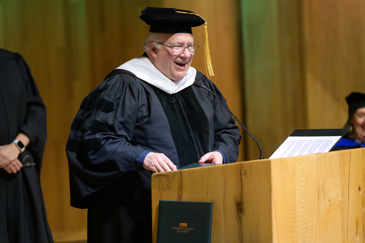 Ira Perman speaks as he receives the Meritorious Service Award.
