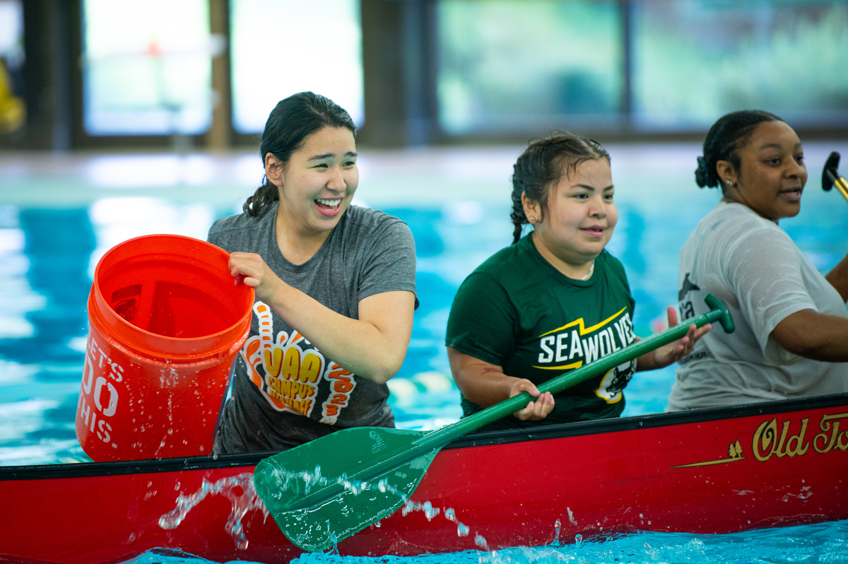 Students compete in Canoe Battleship in UAA's Avis Alaska Sports Center during UAA's 2023 Campus Kickoff.