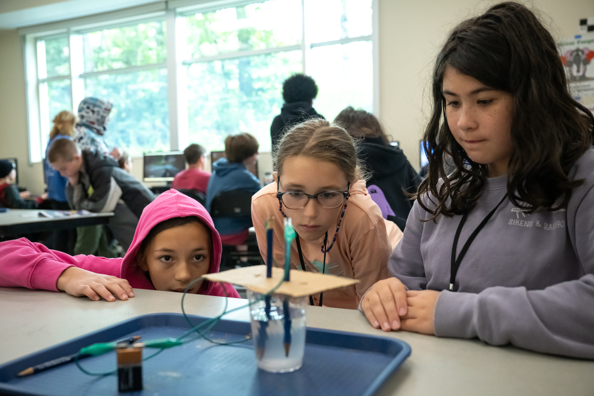 Middle school students learn to separate hydrogen from water using electrolysis as UAA mechanical engineering professor Raghu Srinivasan teaches a UAA Summer Engineering Academy focusing on corrosion chemistry in UAA's Engineering and Computation Building.