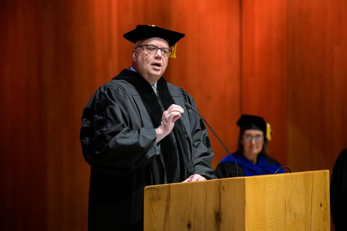 Bill Popp at a lecturn