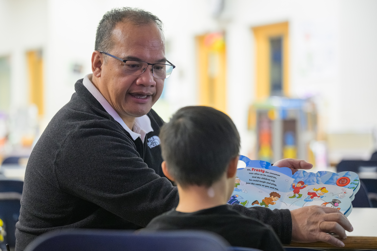 ASD/UAA School of Education Teacher Apprentice Jerson Daraman in the life skills class where he apprentices at Kincaid Elementary School.