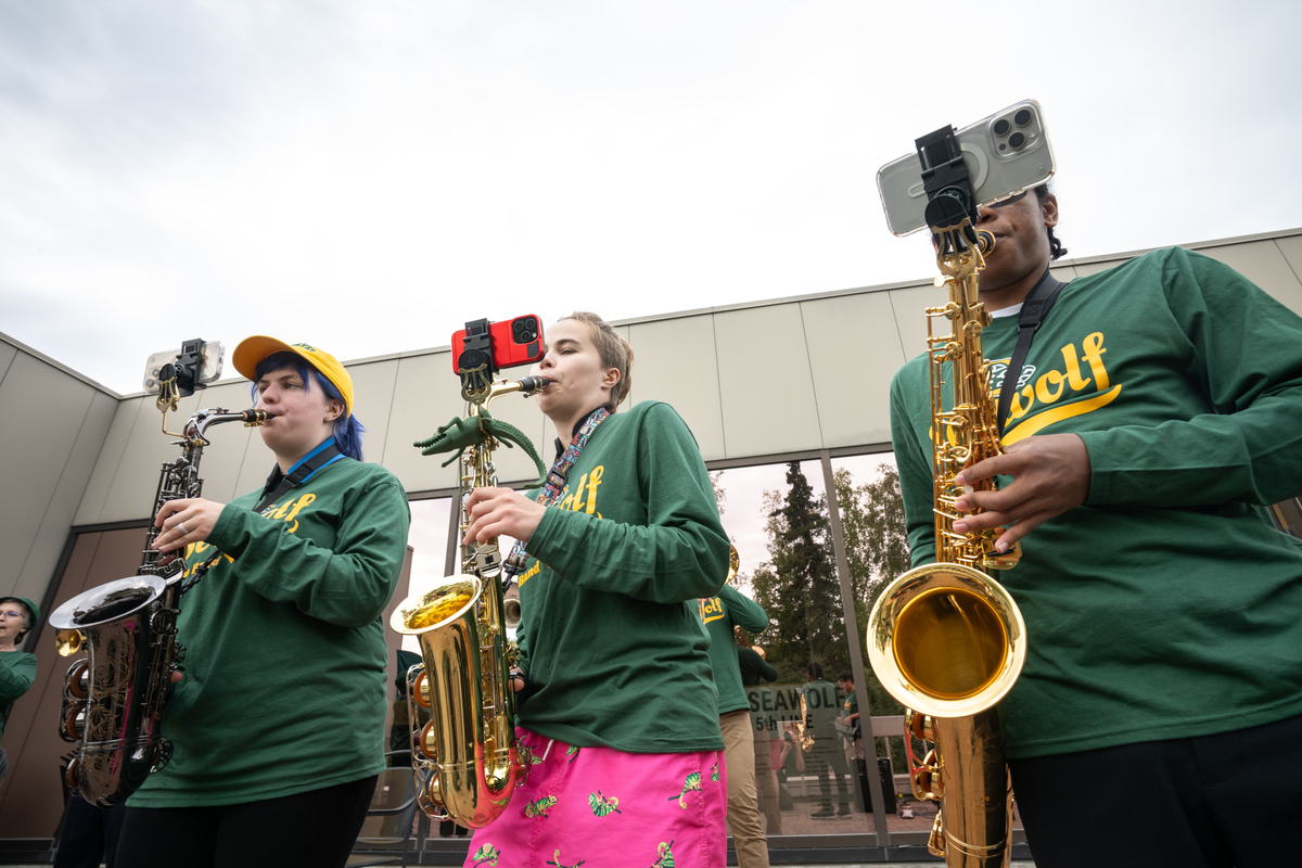 The UAA Pep Band performs on the balcony of the Avis Alaska Sports Complex during UAA's 2025 Campus Kickoff.