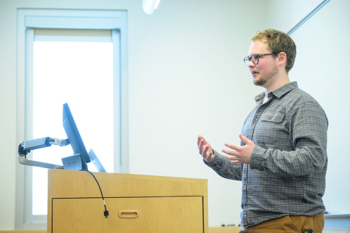 Hunter Thomas presenting his research