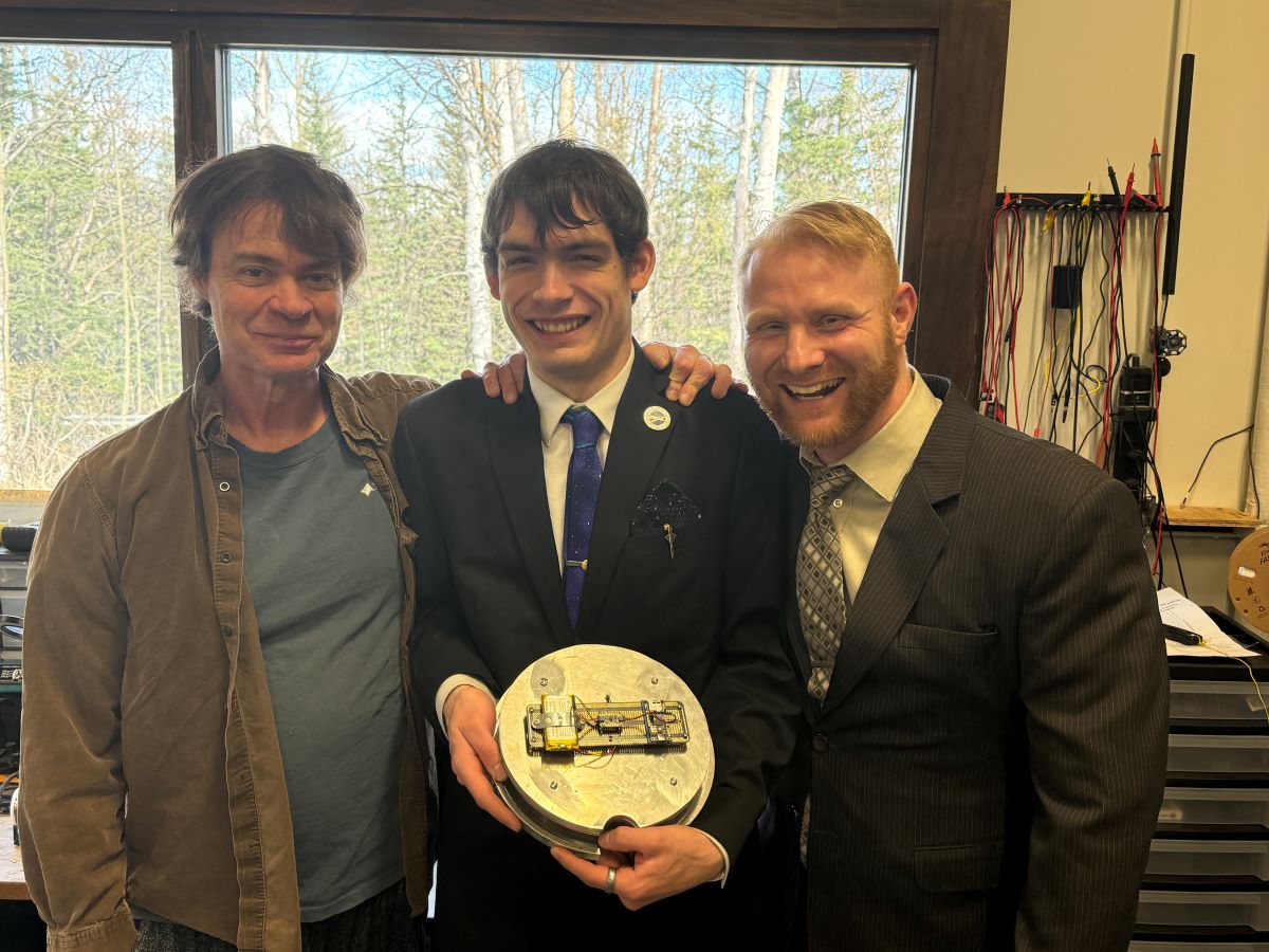 Daniel Nichols, Justice Darby and Kenneth Sparks with their data collection device