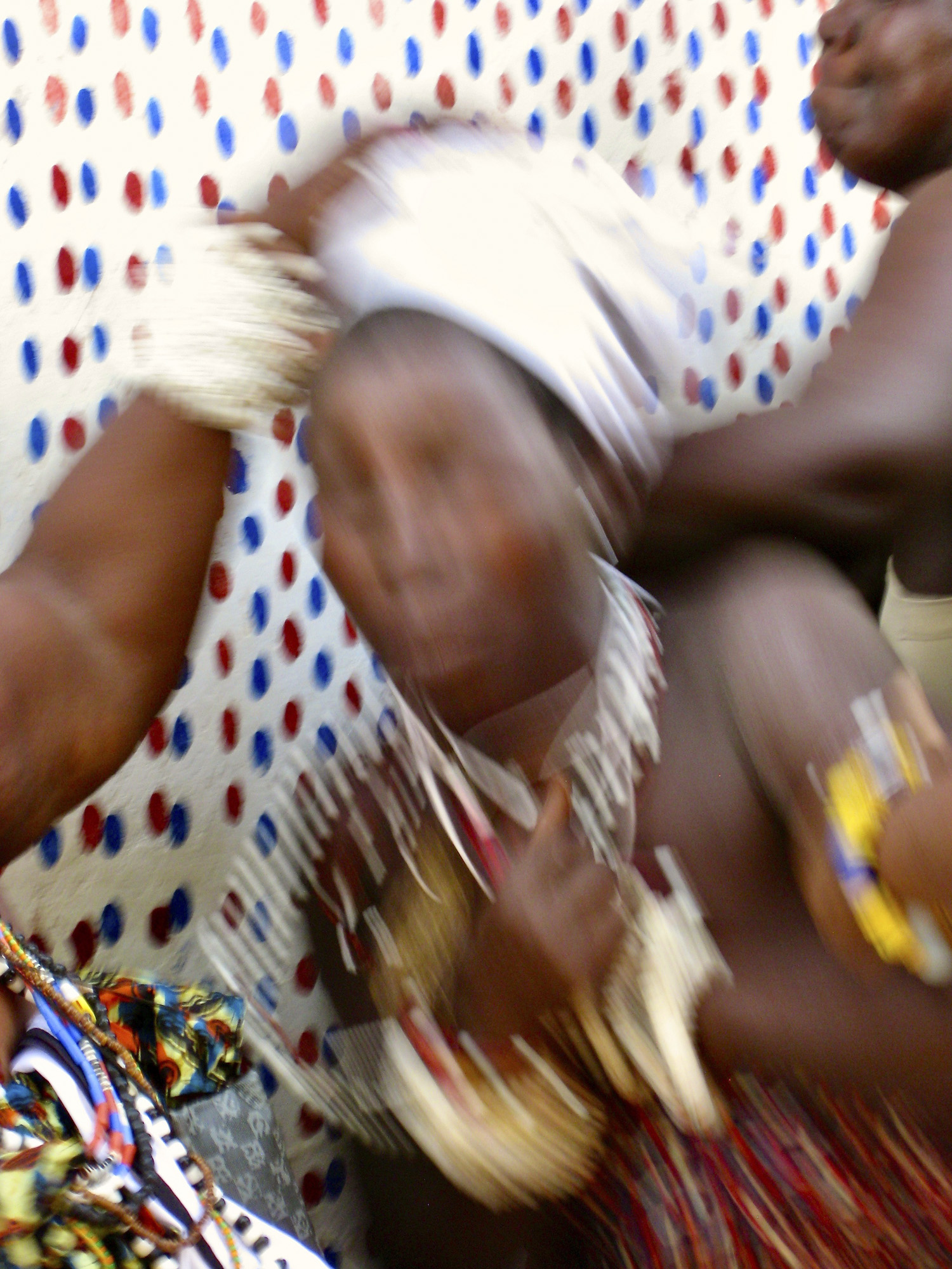 Blurred Dzodze woman possessed against a wall