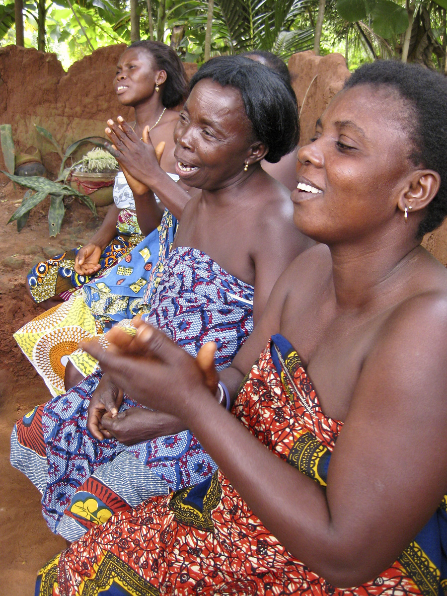 Three women clapping