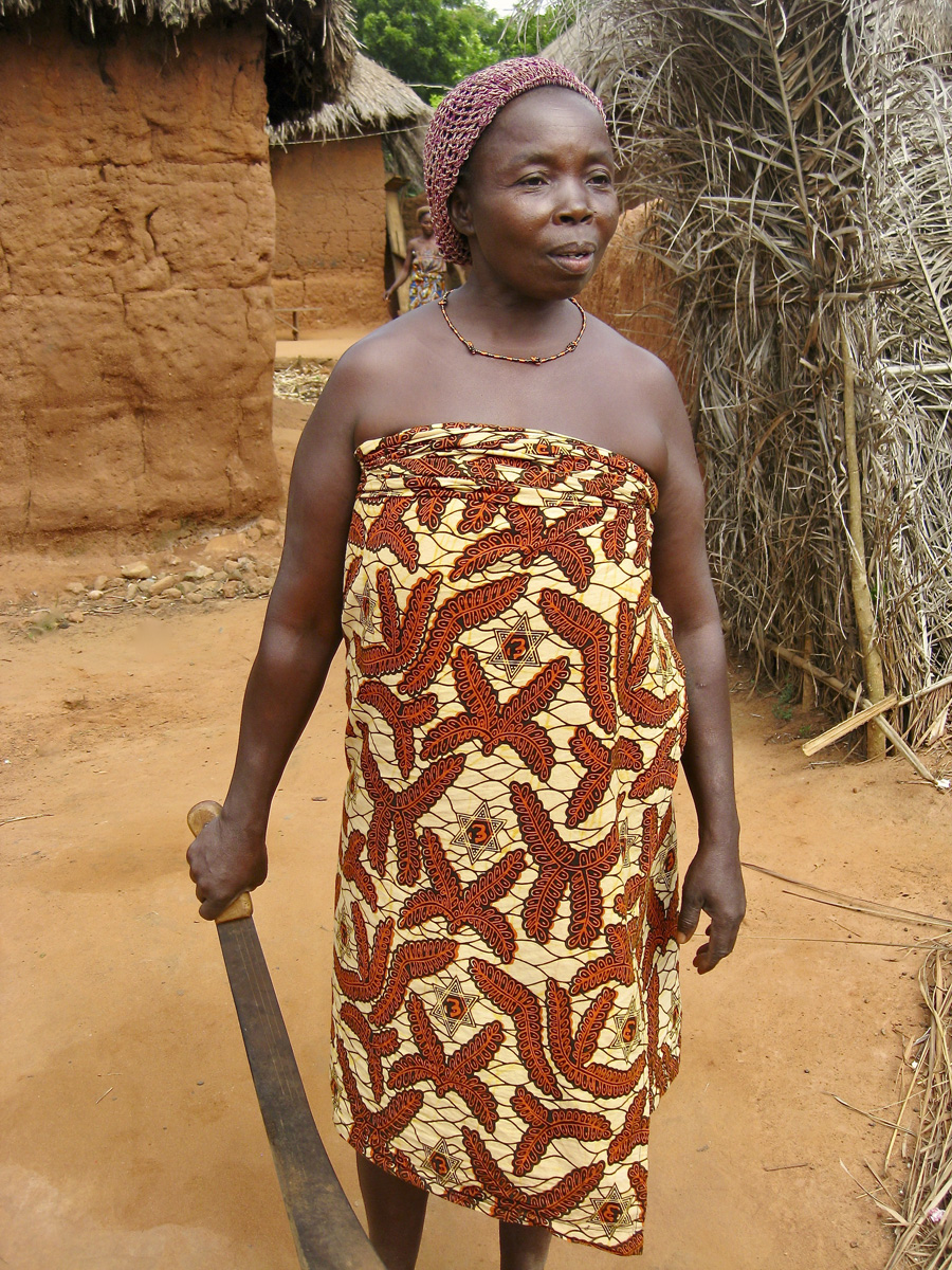 African woman in red and gold dress