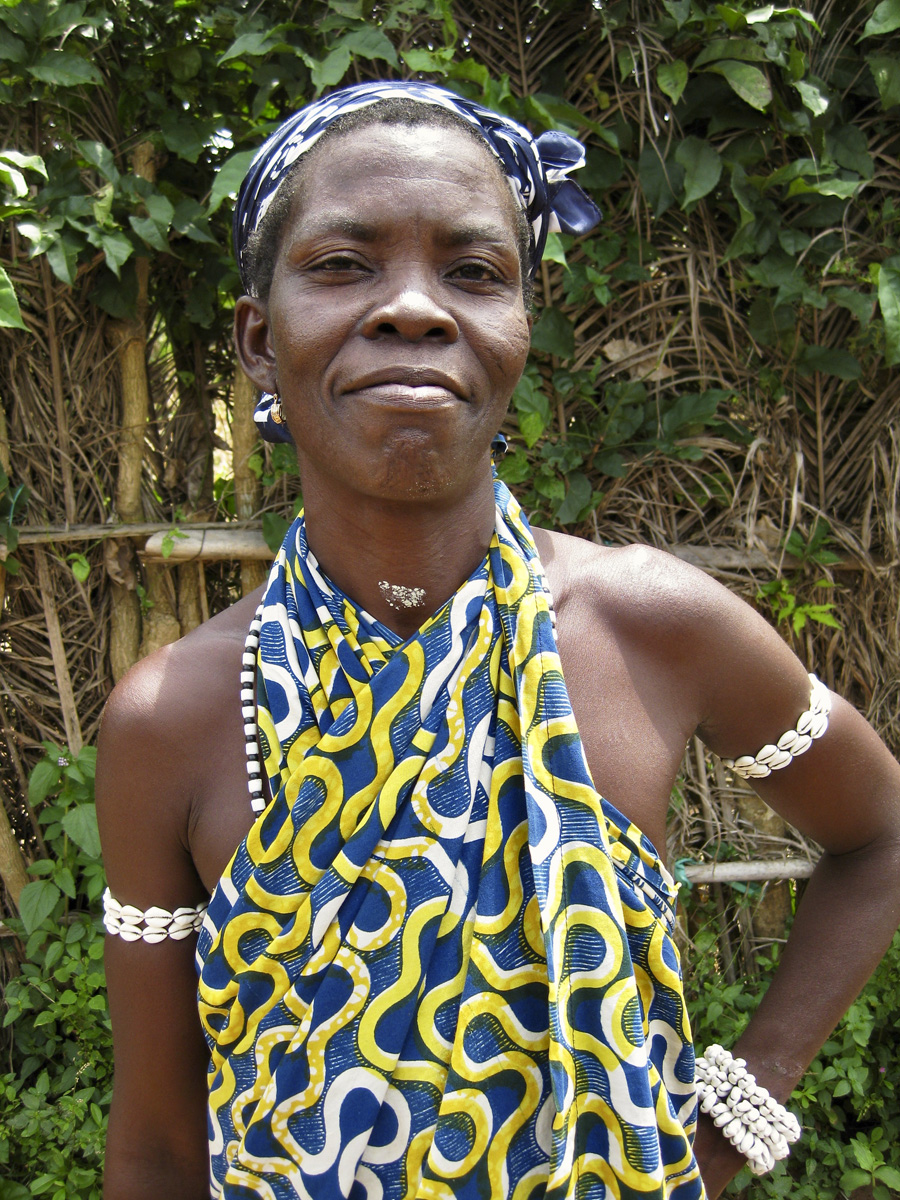 African woman in blue and yellow dress