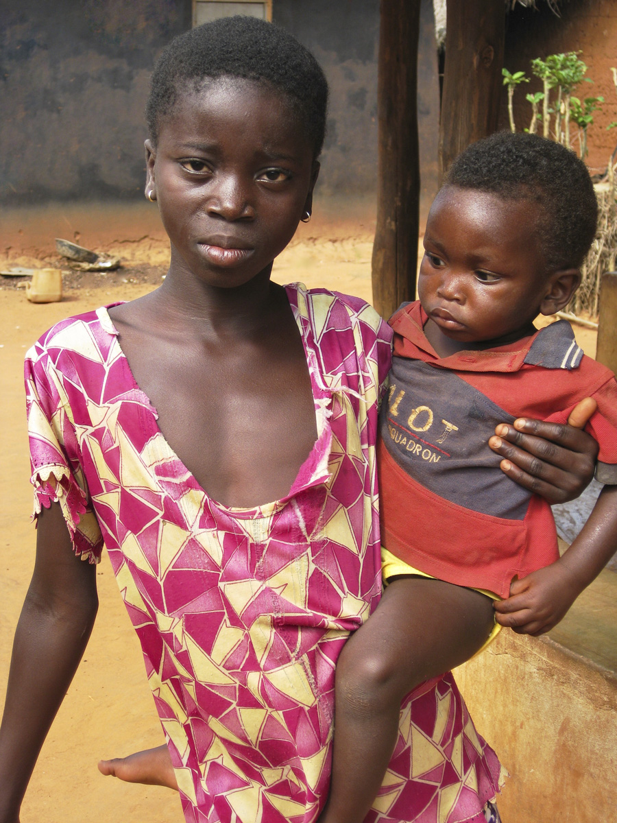 African woman with a baby on her hip