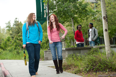 Students walking outside in summer