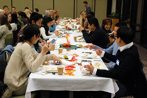 AHAINA Students eating Thanksgiving dinner